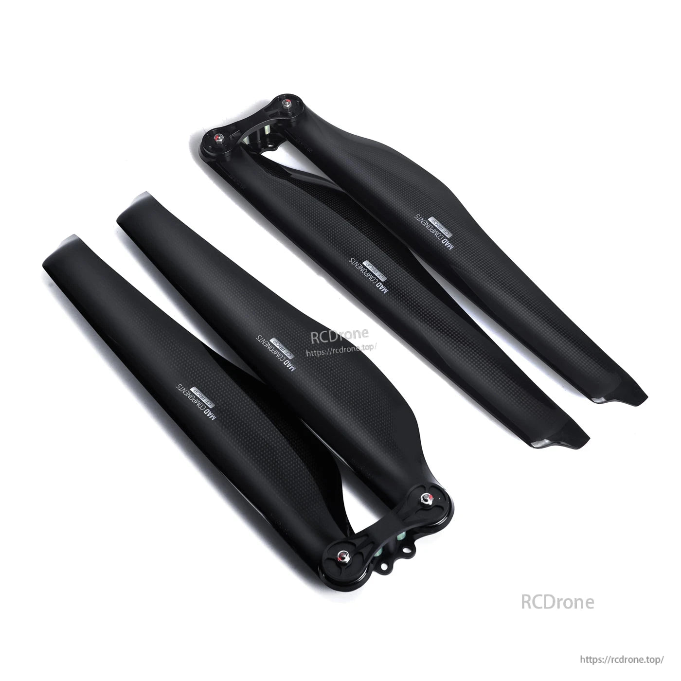 Pair of glossy carbon fiber folding propeller blades with hub mounts, MAD FLUXER Pro for RC drone