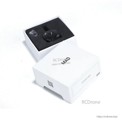 MAD 4014 IPE drone motor in a foam-lined MAD box, with black motor component and small parts bag
