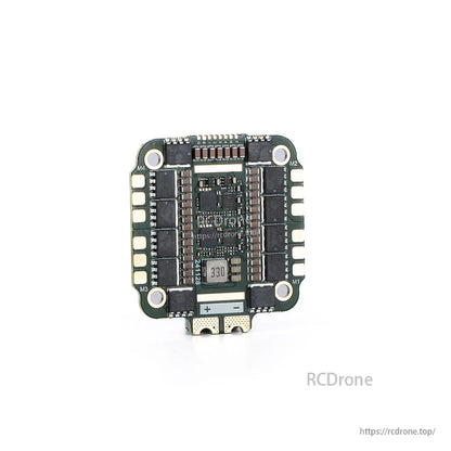 MAD AM32 100A 3-12S 4in1 ESC, Top view of MAD AM32 100A 3-12S 4-in-1 ESC board with motor outputs (M1–M4) and +/− battery pads