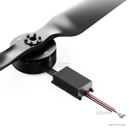 MAD AM40 drone motor with large propeller and finned AMPX FOC ESC module connected by power and signal wires