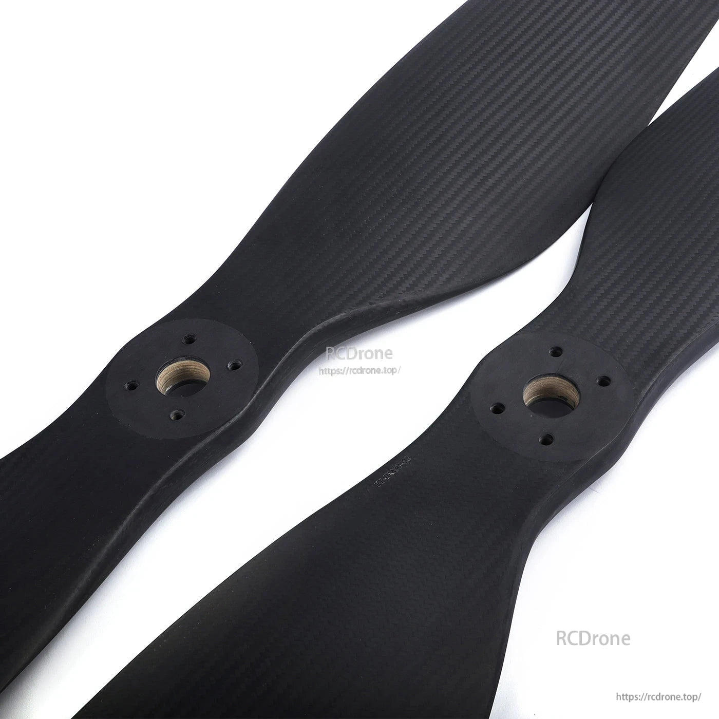 MAD CB2 47.5x18 inch Carbon Fiber Propeller, Pair of MAD CB2 carbon fiber propeller blades with visible weave and metal hub inserts