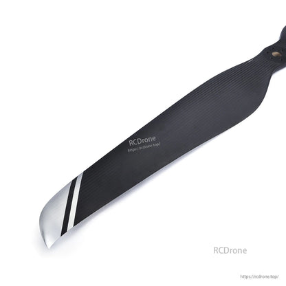 MAD CB2 carbon fiber paramotor propeller blade with matte black finish, silver tip striping, and 6-hole mount