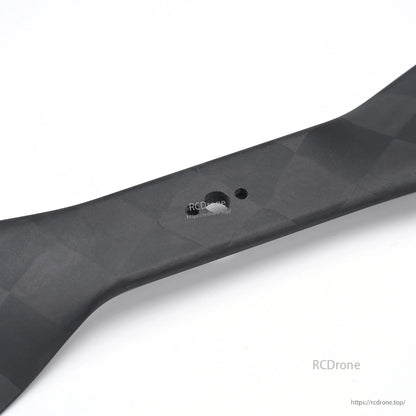 MAD CB2 PRO 15x5.0 Carbon Fiber Propeller, Close-up of MAD CB2 PRO carbon fiber propeller hub with mounting holes and matte weave finish
