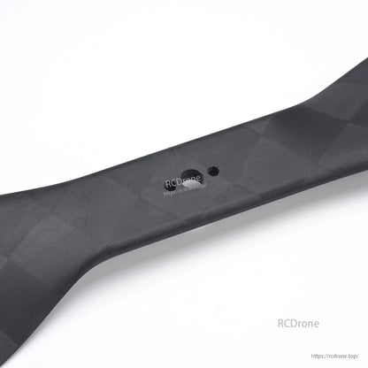 MAD CB2 PRO 18x6.1in Carbon Fiber Propeller, Close-up of MAD CB2 PRO carbon fiber propeller blade with woven finish and center mounting hole