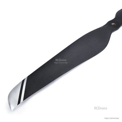 MAD CB2 PROP 52x19 Inch Carbon Fiber Propeller, MAD CB2 carbon fiber propeller blade with visible weave finish, mounting holes, and striped tip