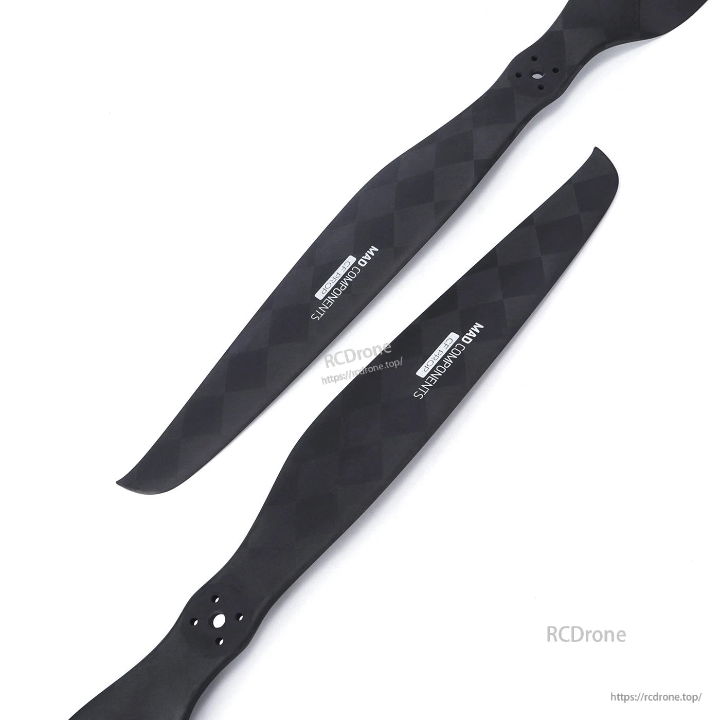 Pair of MAD Components carbon fiber drone propeller blades with matte weave finish and 3-hole hub mount