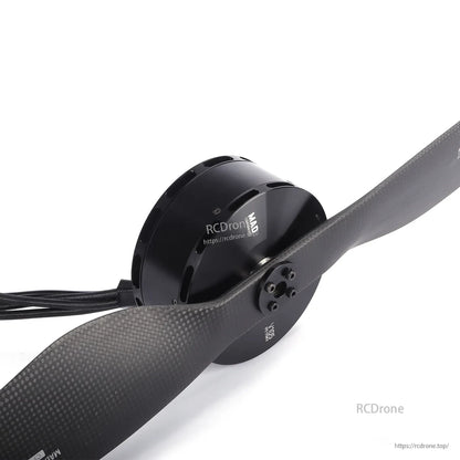 MAD ENCR V105 eVTOL autocenter motor with carbon-fiber propeller attached and power leads