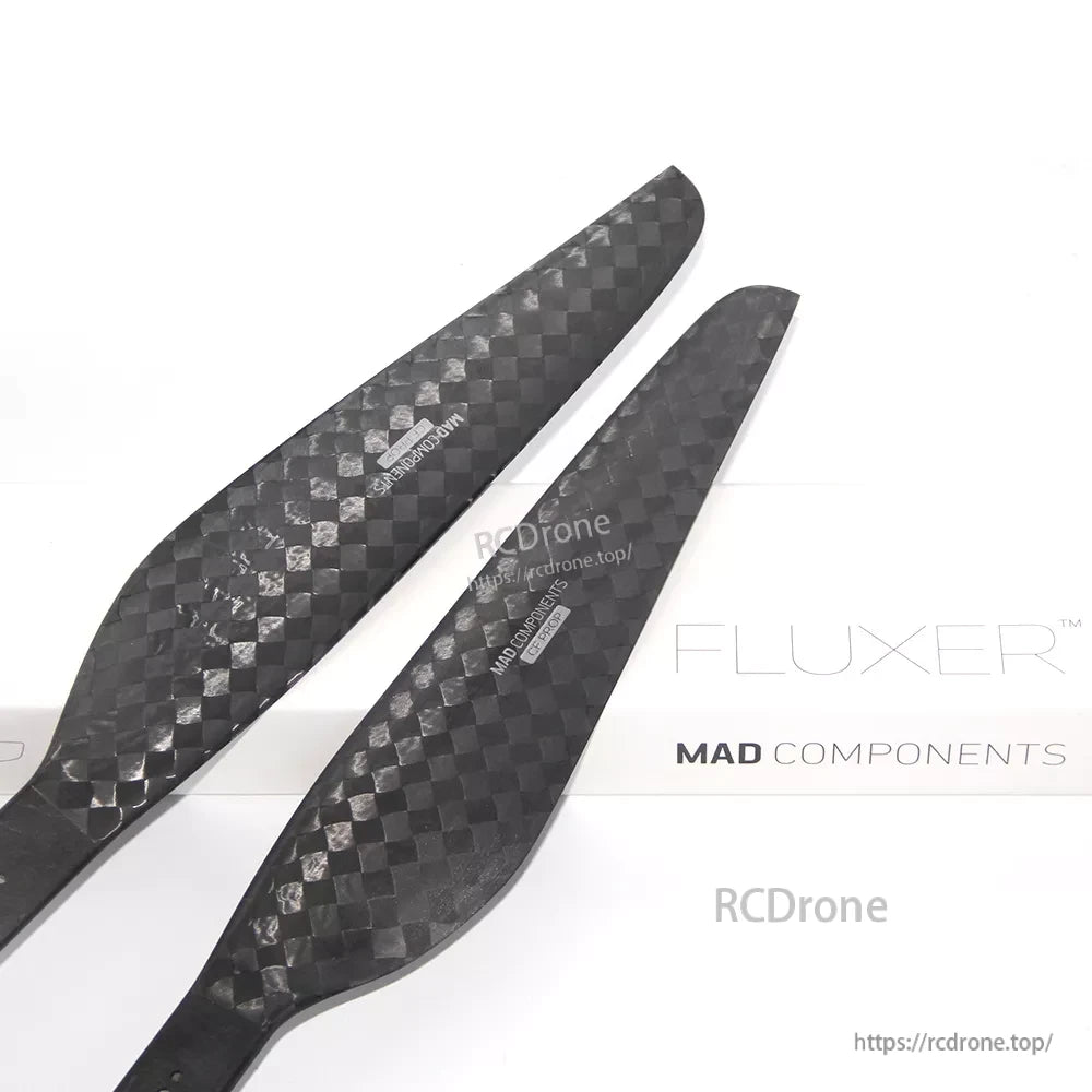 Pair of MAD FLUXER carbon fiber propeller blades with checkerboard weave finish for CW/CCW rotation