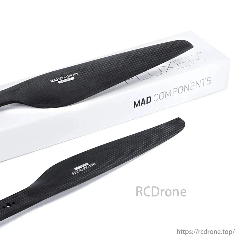 MAD Components Fluxer propeller blades come in a stylish white box, highlighting carbon fiber texture and branding.