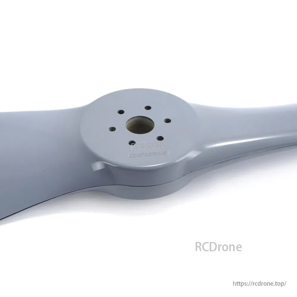 Two-blade paramotor propeller with a gray finish, centered hub and multiple mounting holes