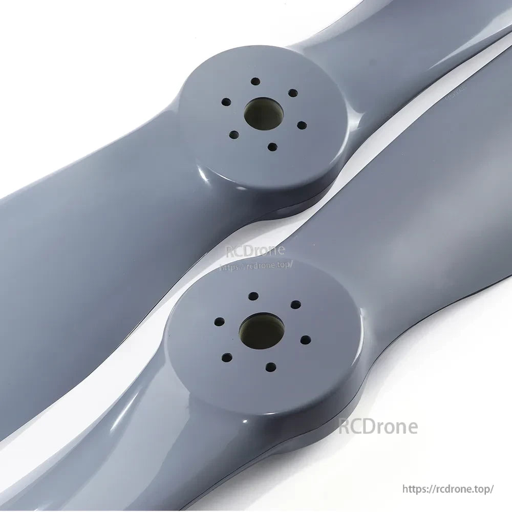 Close-up of MAD FLUXER PRO paramotor propeller hubs with central bore and multiple bolt holes