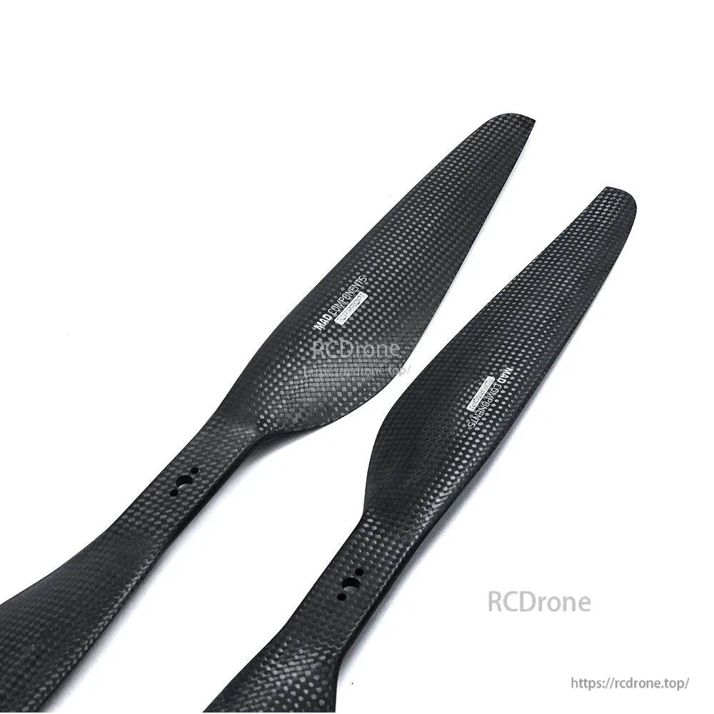 MAD FLUXER Pro 20x6.0 Carbon Fiber Propeller, Pair of MAD FLUXER Pro carbon fiber propeller blades with visible weave finish and mounting holes