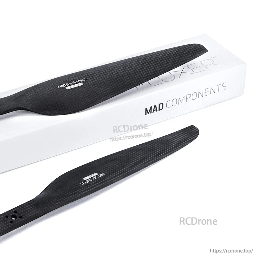 MAD FLUXER Pro 26x7.8 Inch Carbon Fiber Propeller, MAD FLUXER Pro carbon fiber propeller blades with MAD Components branding, displayed alongside the box