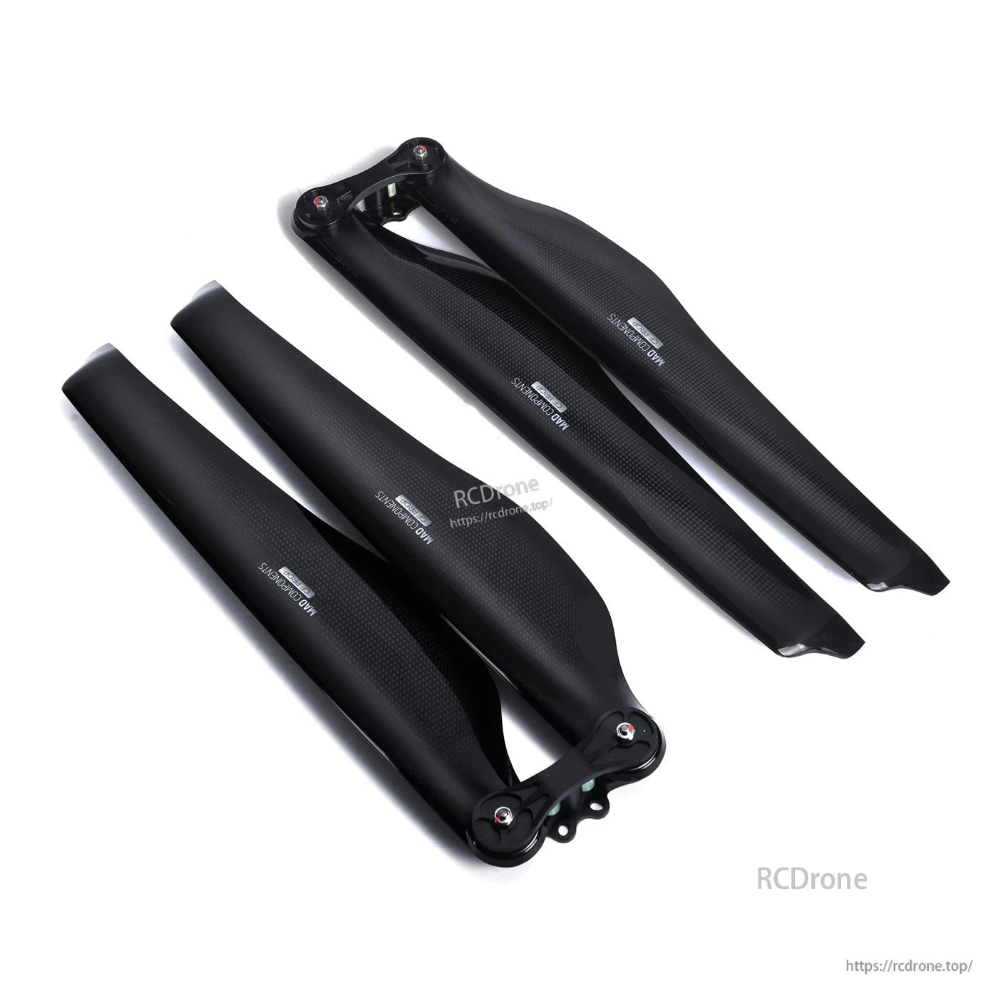 Pair of black carbon fiber folding drone propeller blades with hinged hubs, MAD FLUXER Pro style