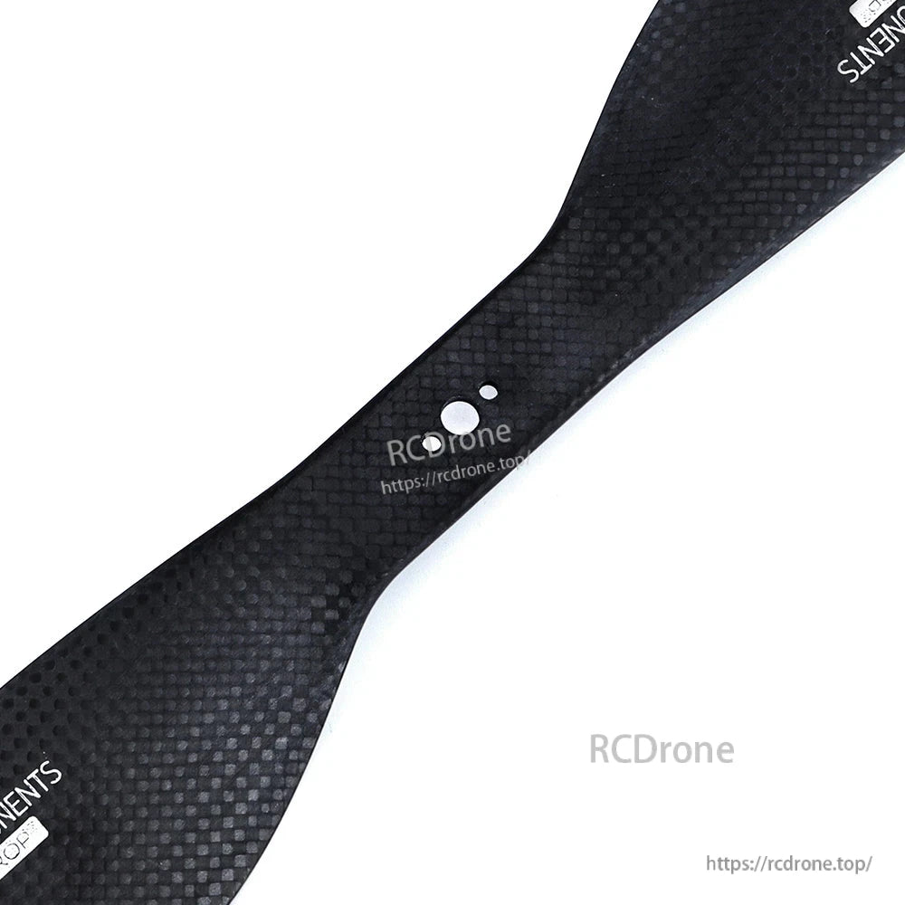 Close-up of a matte carbon fiber propeller blade with woven finish for MAD FLUXER Pro