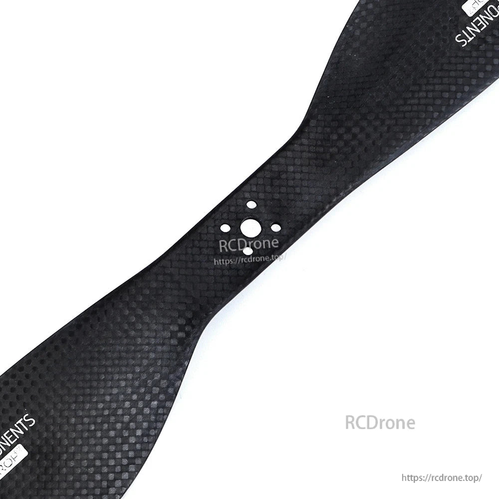 MAD FLUXER Pro Matt Carbon Fiber Propeller, MAD FLUXER Pro matte carbon fiber propeller blade close-up with mounting holes and carbon weave finish
