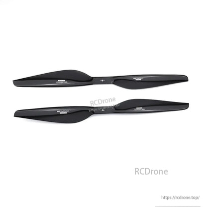 Pair of MAD FLUXER Pro Shine glossy black carbon fiber drone propellers on white background