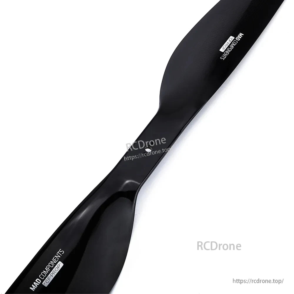 Glossy black carbon fiber drone propeller with MAD Components branding, from MAD FLUXER Pro Shine set