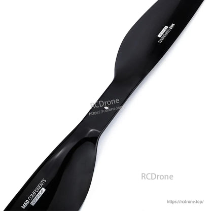 Glossy black carbon fiber drone propeller with MAD Components branding, from MAD FLUXER Pro Shine set