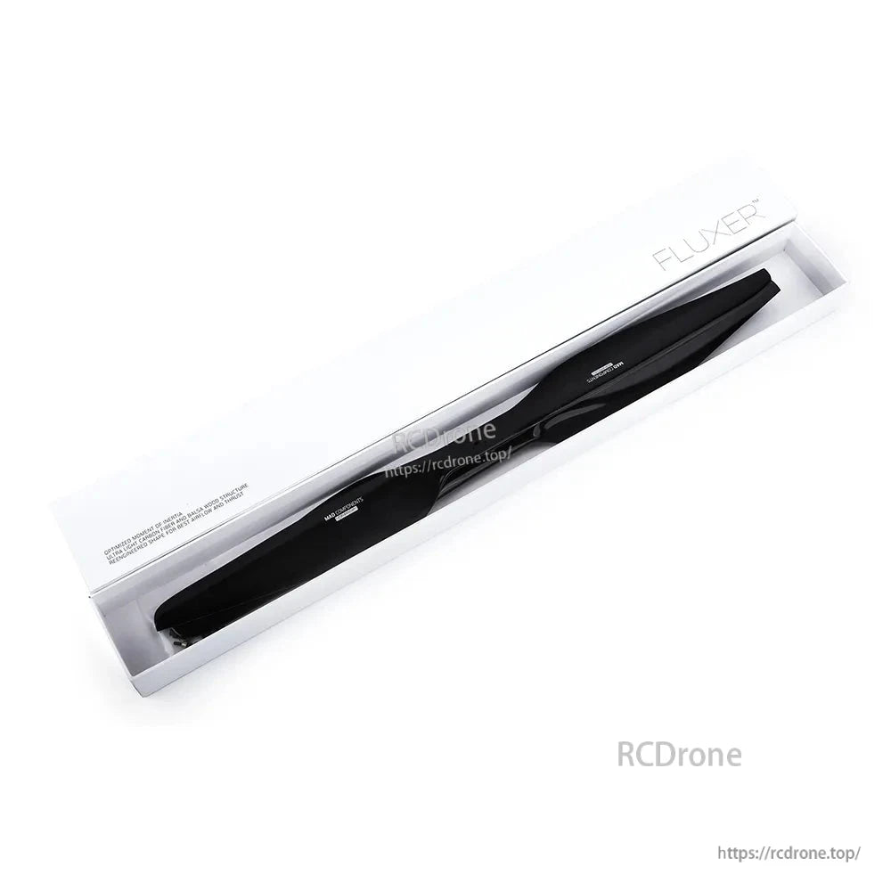 Packaged pair of black FLUXER drone propellers in a clear box with white sleeve