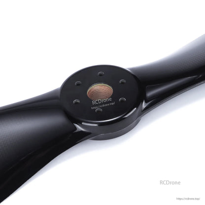 Glossy black carbon fiber 2-blade propeller with center hub and mounting holes, PRO SERIES style