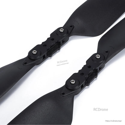 MAD HAVOC 32x10.5in Polymer Folding Propeller, MAD HAVOC 32x10.5in black polymer folding propellers with bolt-on hubs and folding blades on a white background