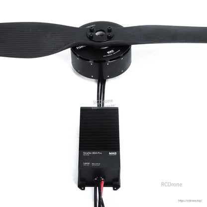 MAD drone motor with propeller connected to SineSic 80A Pro 16kW ESC, showing wiring and mounting layout