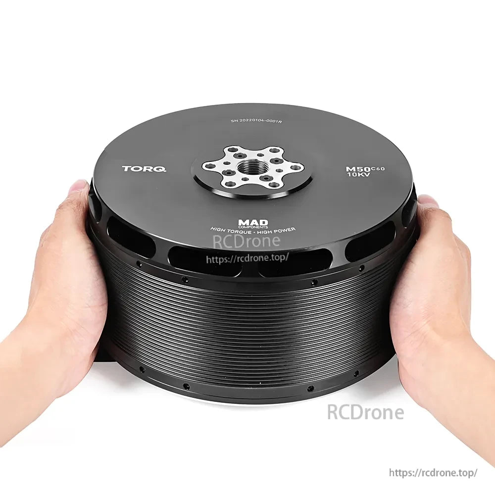 MAD M50C60 PRO IPE Manned Motor, MAD M50C60 PRO IPE motor with TORQ top plate, central mounting hub, and ribbed cylindrical housing