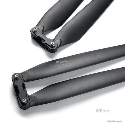 MAD TIPUP 43x14in polymer folding propeller with two black folding blades and hinge hubs with screws