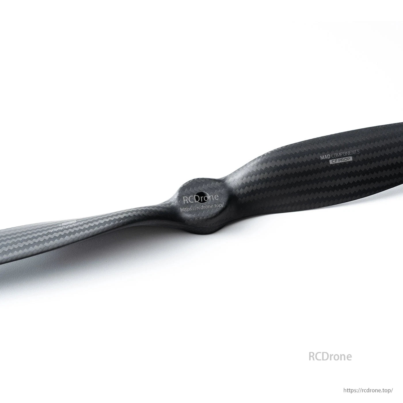MAD Components Voyager carbon fiber propeller with glossy CF weave finish and central hub for RC aircraft