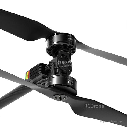 MAD XH14 coaxial drone arm assembly with stacked motors, dual propellers, and wiring on a carbon-fiber arm