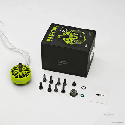 Package contents: NEON motor box, one green motor, screws, nut, washers and MEPS card