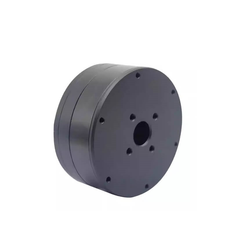 Angled rear view of motor showing shaft opening area and circular mounting pattern on back plate