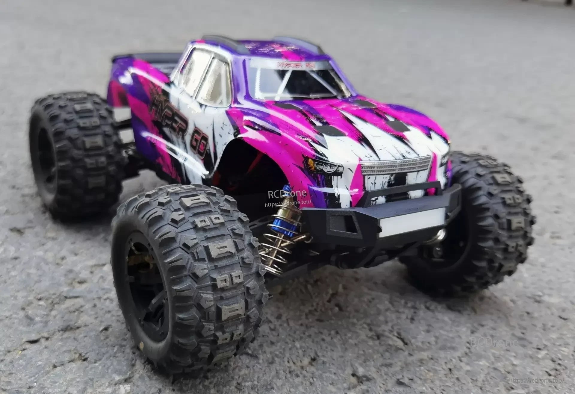 MJX Hyper Go 1/16 Brushless RC Car, The MJX Hyper Go is a 1:16 scale 4WD car with 4 channels, 45km/h speed, and 10-minute flight time.