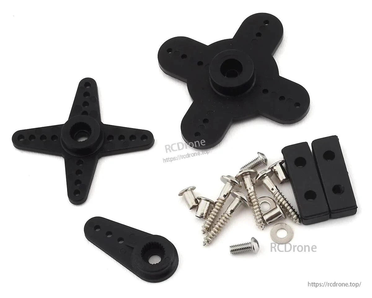 Black servo motor parts—screws, washers, brackets—neatly arranged on white background.