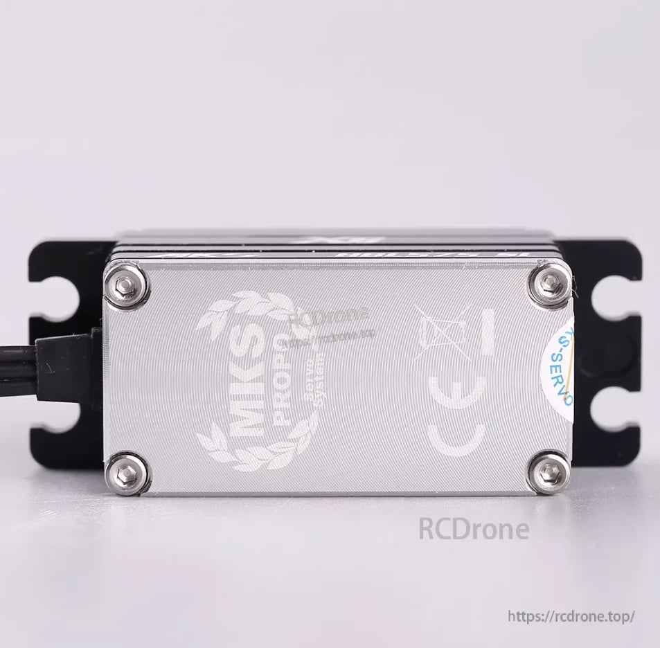MKS PROPO servo: CE-marked, titanium gears, low-profile brushless motor, four-screw mount, black brackets.
