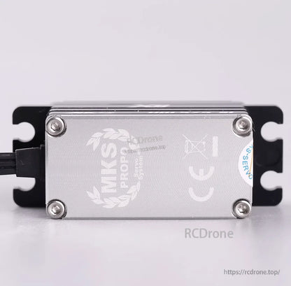 MKS PROPO servo: CE-marked, titanium gears, low-profile brushless motor, four-screw mount, black brackets.