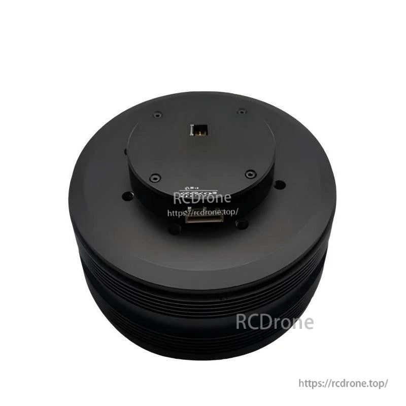 Top view of round black servo motor housing with connector openings and mounting holes (watermarked image)