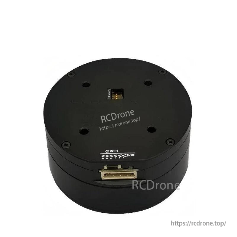 Top view of servo motor housing with mounting holes, alignment markings, and recessed header connector