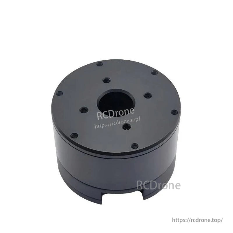 Top view of black cylindrical servo motor housing with center bore and bolt pattern (watermarked)