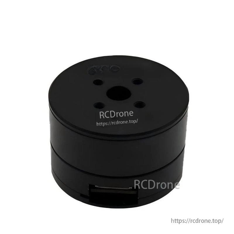 Top view of black cylindrical servo motor with RCDRone watermark, showing mounting holes and side connector opening