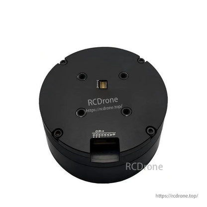 Rear view of black servo motor housing showing connector opening and mounting holes (RCDRone watermark)