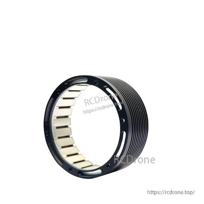 Outer rotor ring close-up with internal magnet segments and ribbed black housing for RMD-FLO-50 motor