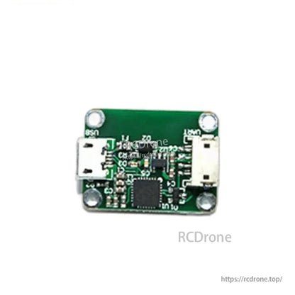 USB-to-UART board close-up with micro USB port and opposite-side connector on green PCB