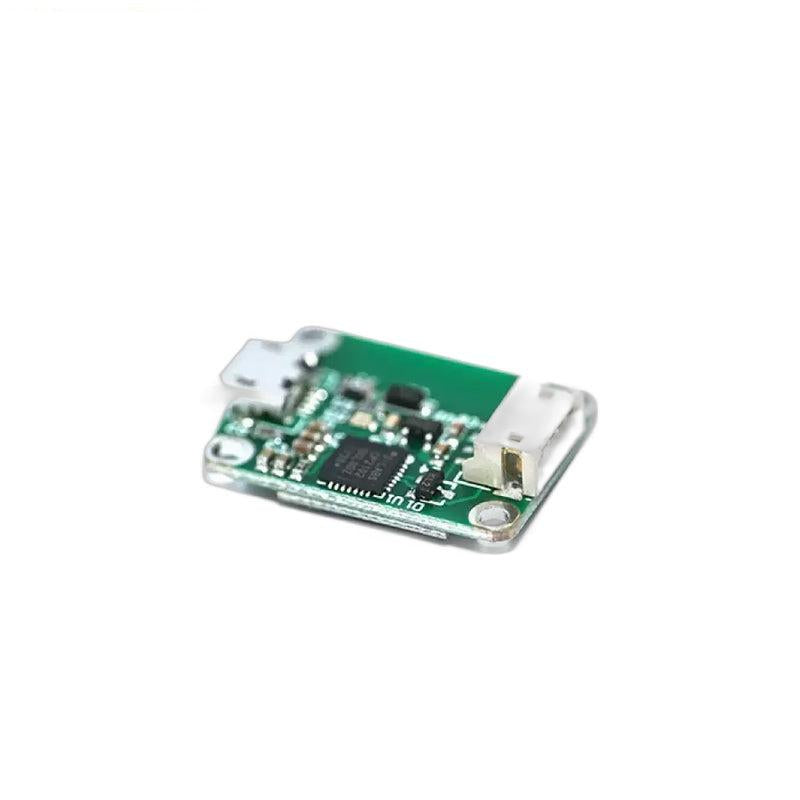 Angled view of USB serial interface board showing edge-mounted connectors and main IC