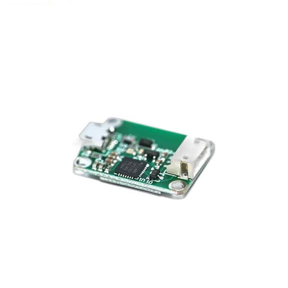 Angled view of USB serial interface board showing edge-mounted connectors and main IC