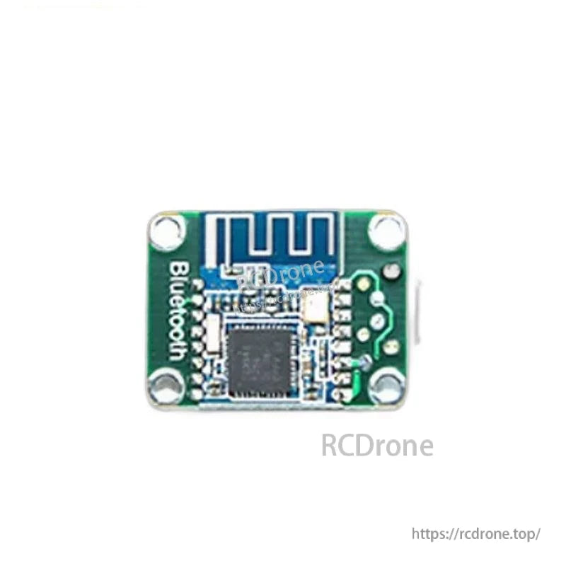 Top-down view of Bluetooth add-on board showing antenna trace, main chip, and mounting holes