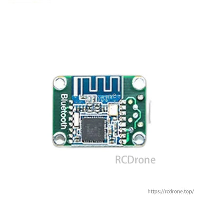 Top-down view of Bluetooth add-on board showing antenna trace, main chip, and mounting holes