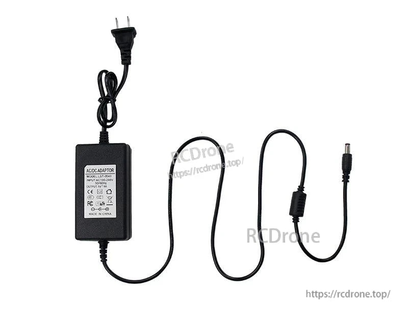 Power adapter specification label and cable layout with US plug and DC barrel tip