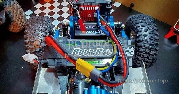Hardcase LiPo battery installed in a 1/10 RC car battery tray with strap, heavy-duty leads, and connector